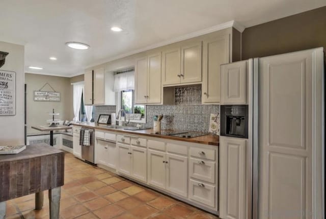 kitchen with sink, tasteful backsplash, black electric stovetop, paneled fridge, and stainless steel dishwasher