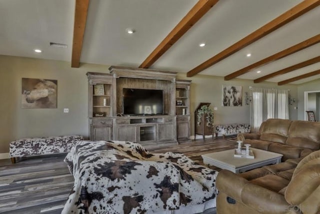 living room with dark wood-type flooring and beamed ceiling