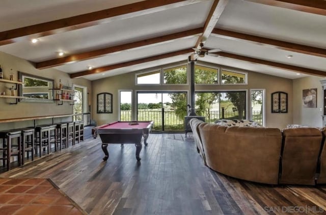 game room featuring dark wood-type flooring, vaulted ceiling with beams, pool table, indoor bar, and ceiling fan