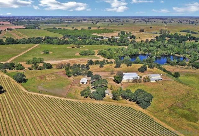 bird's eye view featuring a rural view and a water view