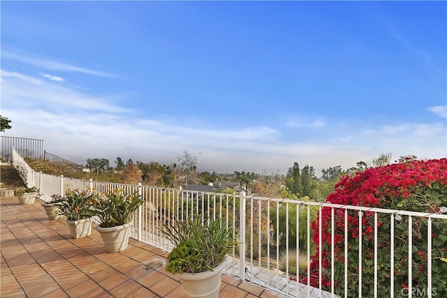 view of patio featuring fence