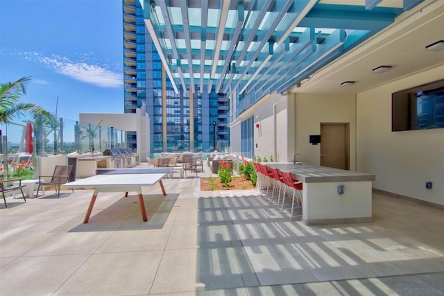 view of patio / terrace with a wet bar