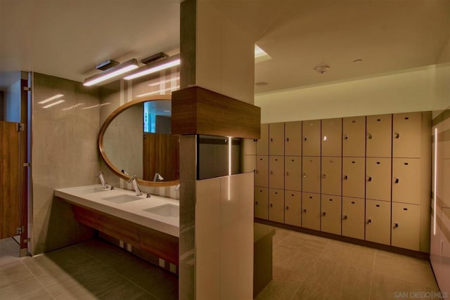 bathroom featuring tile patterned floors, vanity, and a mail area