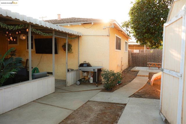 view of property exterior with a patio