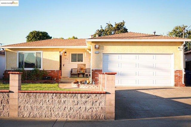 ranch-style home with a garage