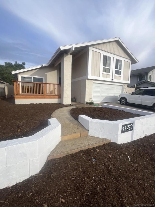 view of side of property with a garage