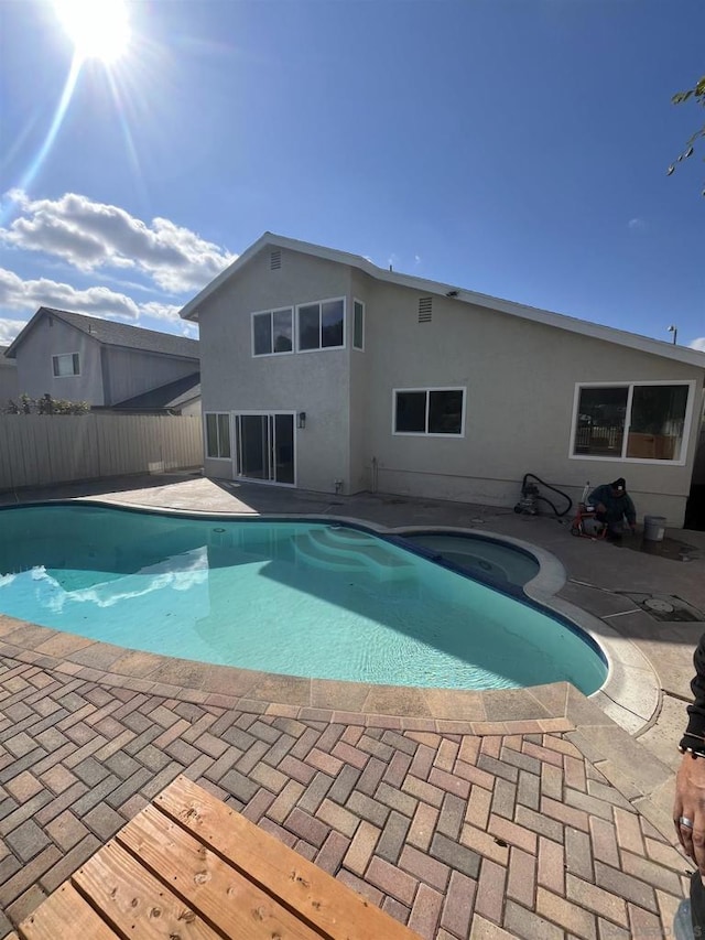 view of pool featuring a patio