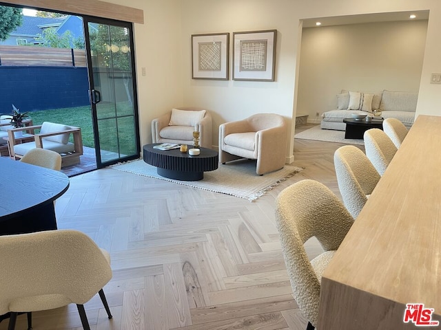 living room featuring parquet flooring