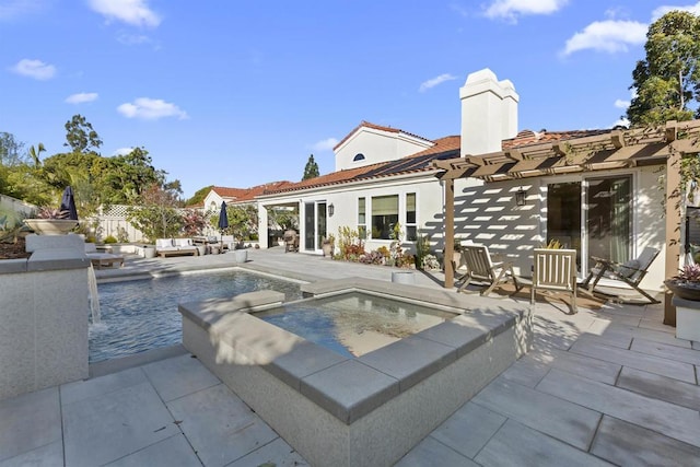 view of swimming pool featuring an in ground hot tub, a pergola, and a patio