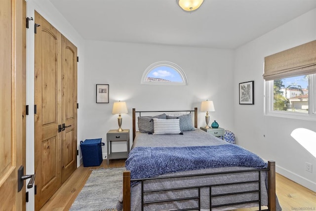 bedroom featuring light hardwood / wood-style floors