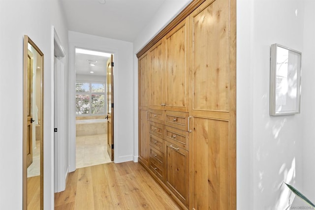 hall featuring light wood-type flooring