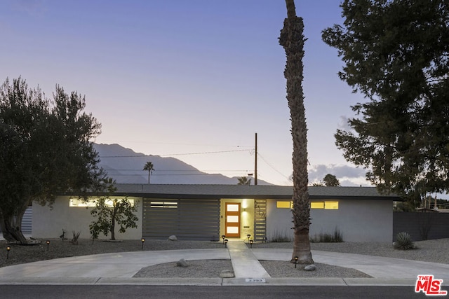 view of front of house with a mountain view