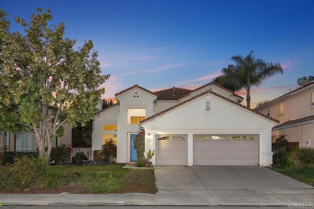 view of front of home with a garage