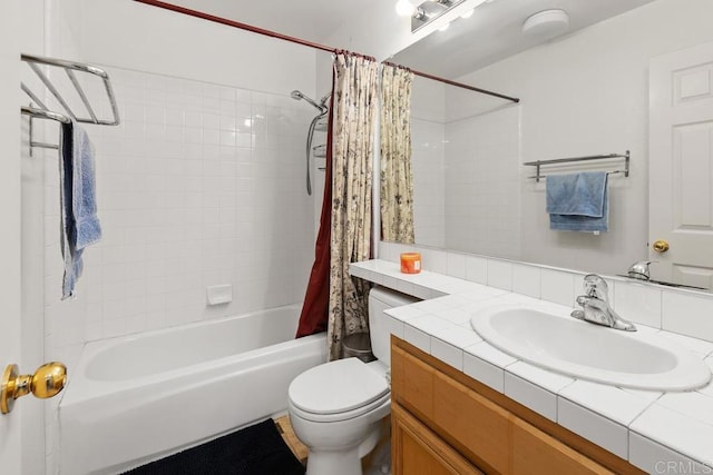 full bathroom featuring toilet, vanity, and shower / bath combo