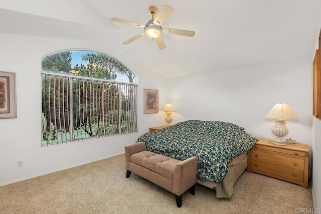 bedroom with carpet floors, baseboards, a ceiling fan, and vaulted ceiling