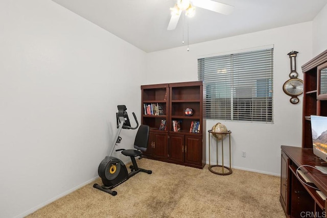 workout area with carpet flooring, baseboards, and ceiling fan