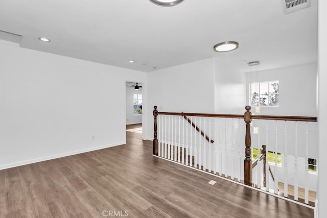 empty room featuring hardwood / wood-style floors