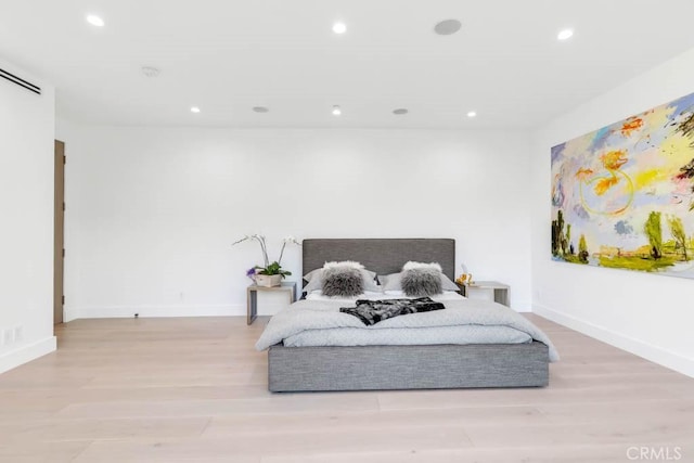 bedroom featuring light hardwood / wood-style flooring