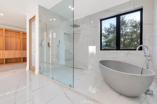 bathroom with a tub