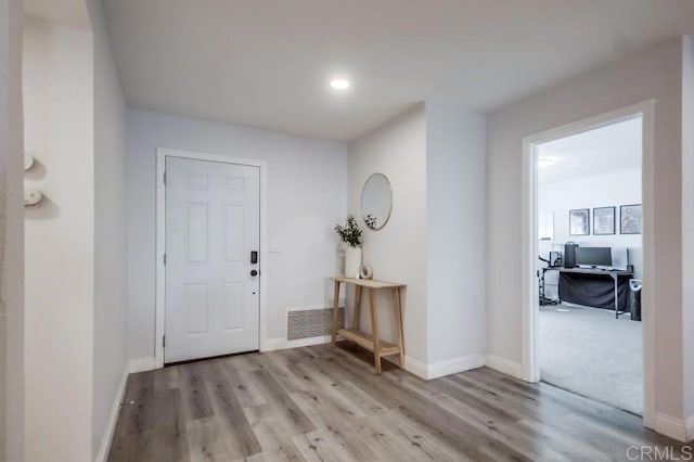 entryway with light wood-type flooring