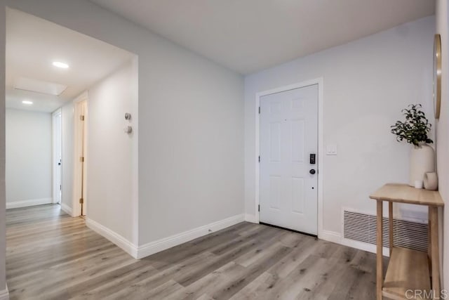 foyer featuring light wood-type flooring