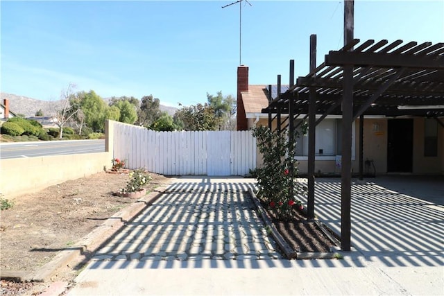 view of patio featuring a pergola