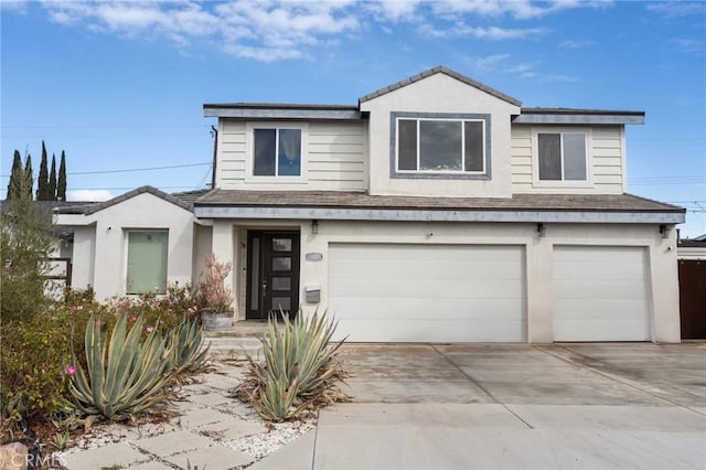 view of front of property featuring a garage