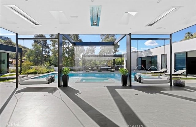 interior space with pool water feature and a skylight