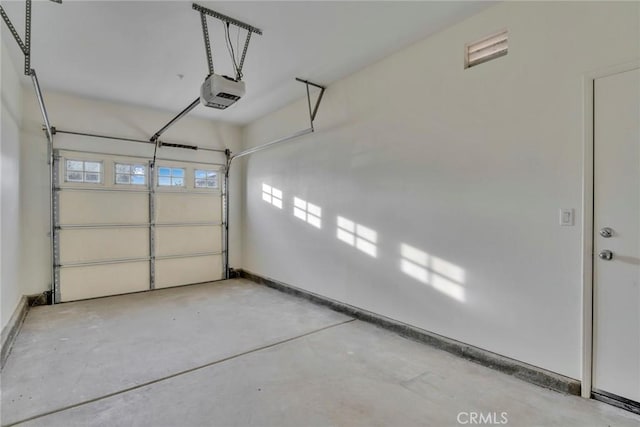 garage with a garage door opener