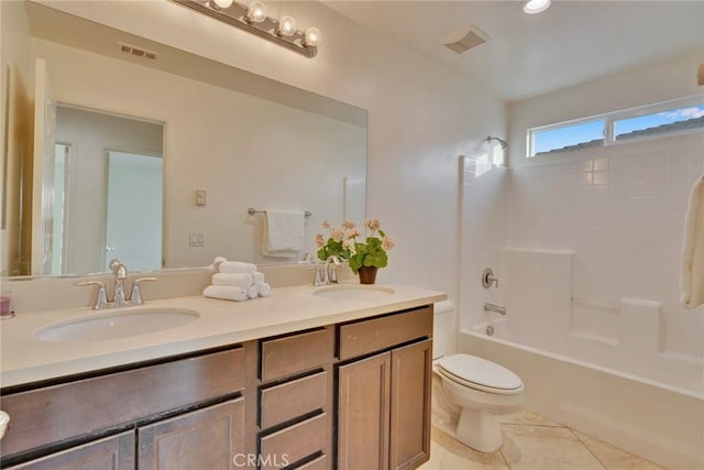 full bathroom with vanity, tile patterned flooring, bathing tub / shower combination, and toilet