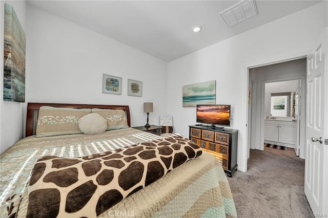 bedroom featuring light carpet