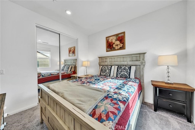 bedroom with carpet flooring and a closet