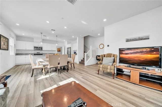 living room featuring light hardwood / wood-style flooring