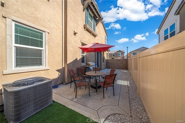 view of patio with cooling unit