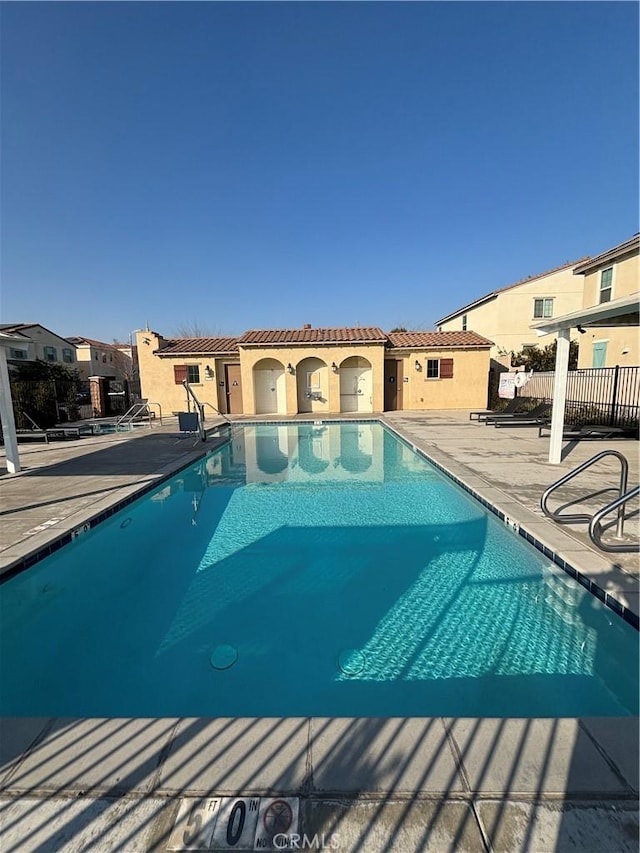 view of pool featuring a patio