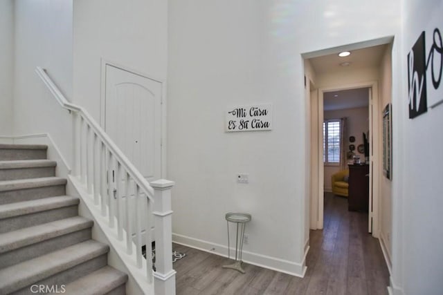 stairway with wood-type flooring