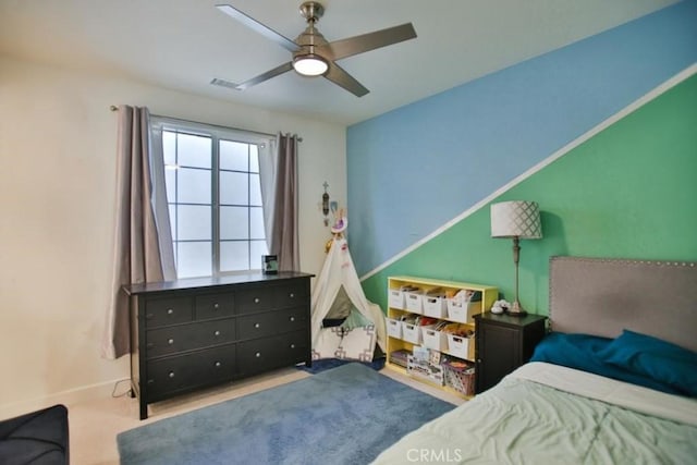 carpeted bedroom featuring ceiling fan