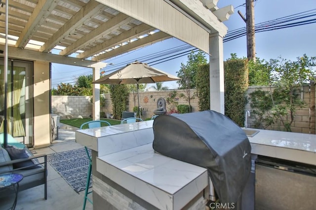 view of patio / terrace with a grill