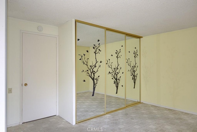 interior space featuring a textured ceiling