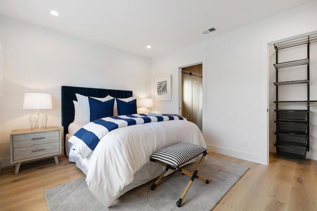 bedroom featuring light hardwood / wood-style flooring