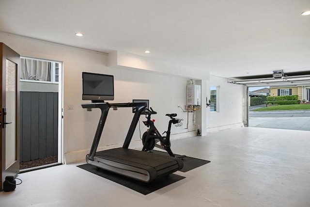 workout room featuring tankless water heater