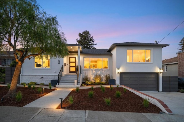 view of front of home with a garage