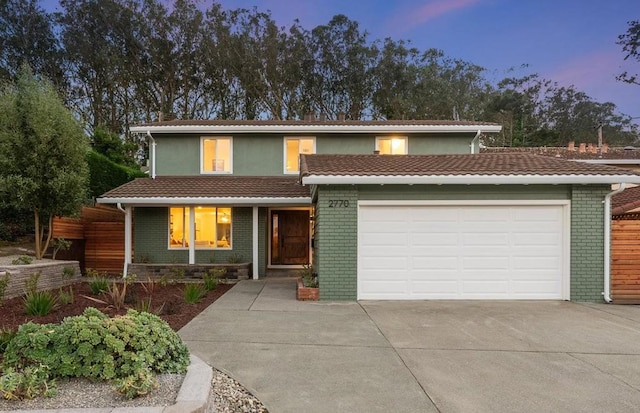 view of front of house with a garage