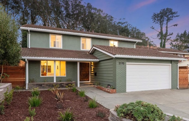 view of property featuring a garage