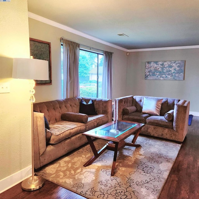 living room featuring wood-type flooring and ornamental molding