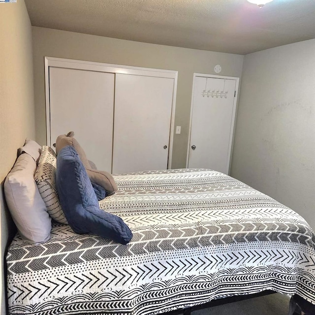 bedroom with a textured ceiling