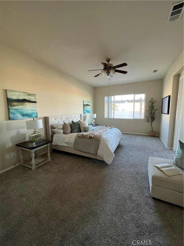 bedroom featuring ceiling fan and dark colored carpet