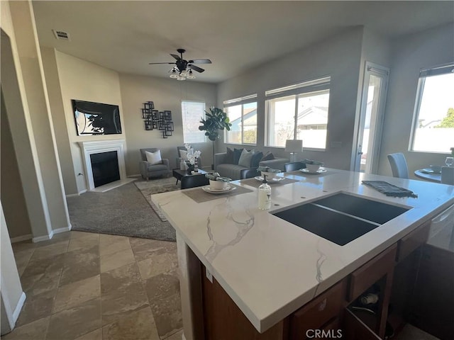 kitchen featuring ceiling fan