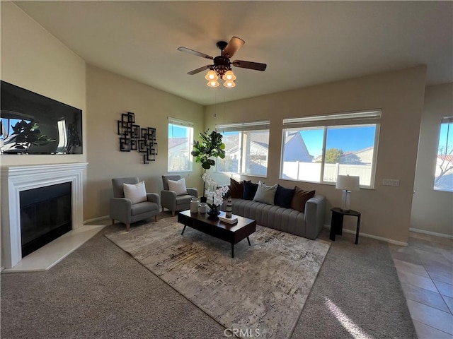 tiled living room featuring ceiling fan