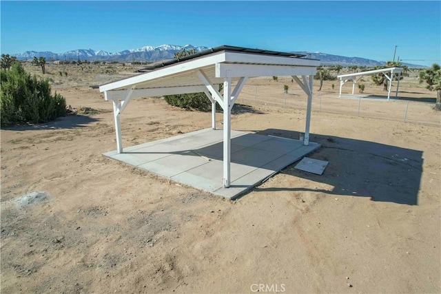 exterior space featuring a rural view and a mountain view